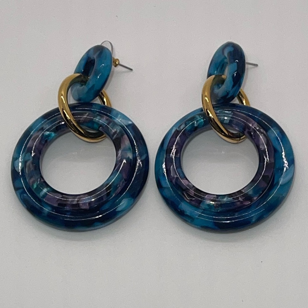 Lele Sadoughi blues/purple/sea colors- acetate hoops w/ gold accentes on ring.